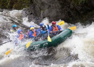 Whitewater rafting Lochsa River and smashing through a rapid