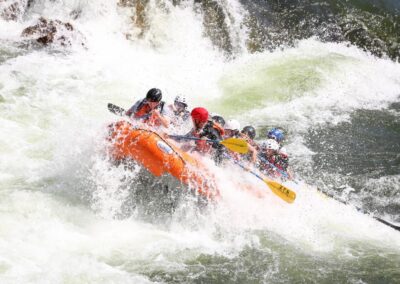Rafting Alberton Gorge trip orange raft on rapids.